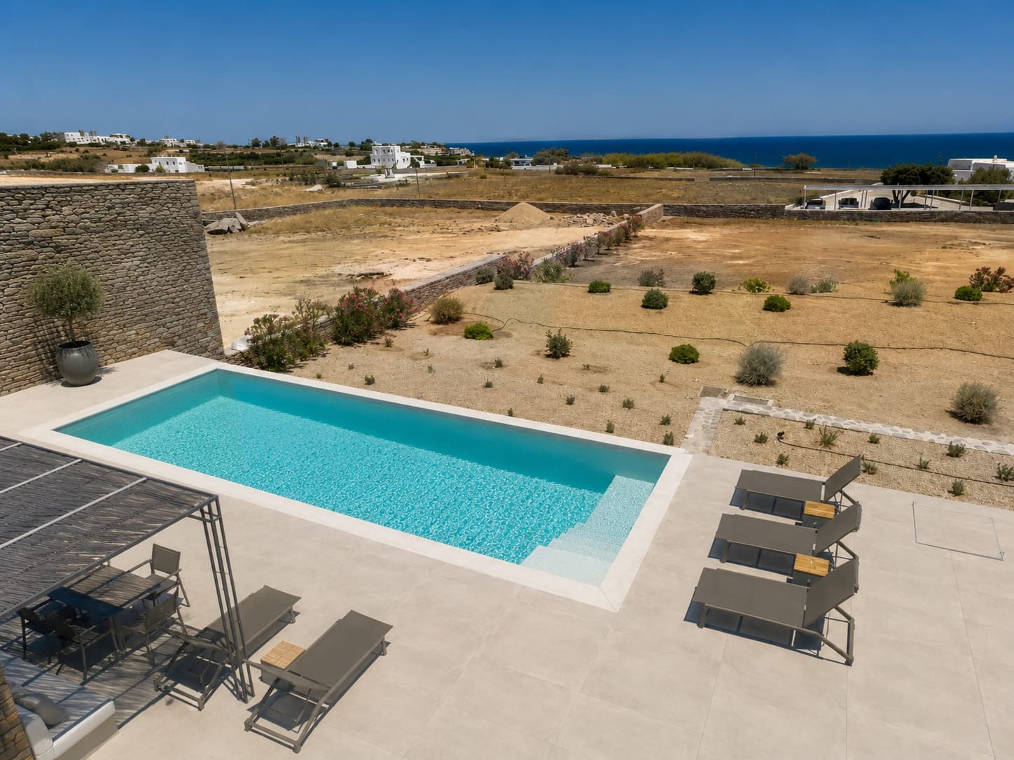 Pool terrace of Villa Sabbia looking towards Naxos